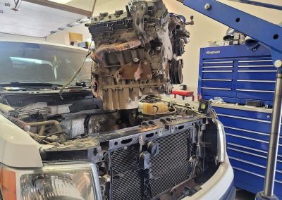CJM Auto engine on lift