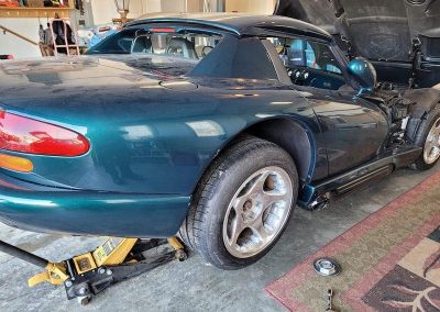 CJM Auto teal car